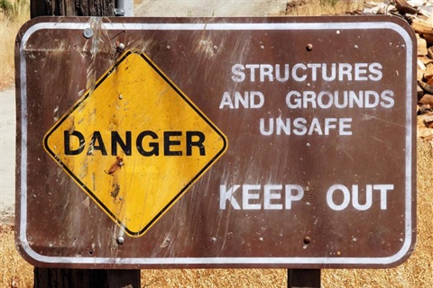 Sign denoting an unsafe structure or building